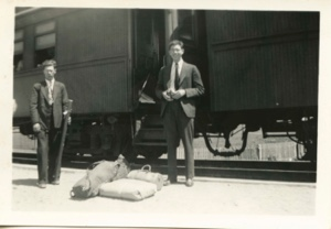 Image of men by Boston to Sydney train